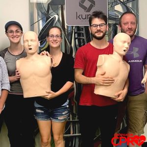 CPR certification training with mannequins in Denver. Learn life-saving skills from certified instr.