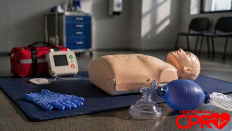 CPR training manikin with AED and rescue mask for certification in Denver.