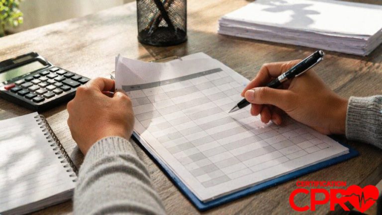 Person filling out a form for CPR certification in Denver, Colorado.