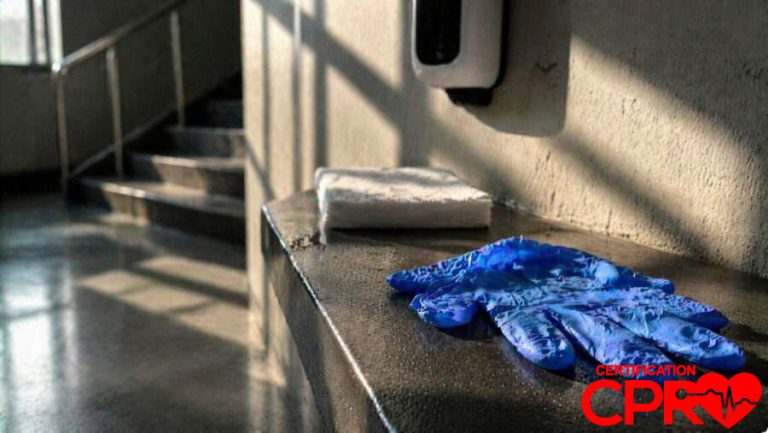 CPR training gloves and mask on a training station in Denver.