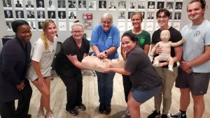 Group CPR training session in Denver for certification.